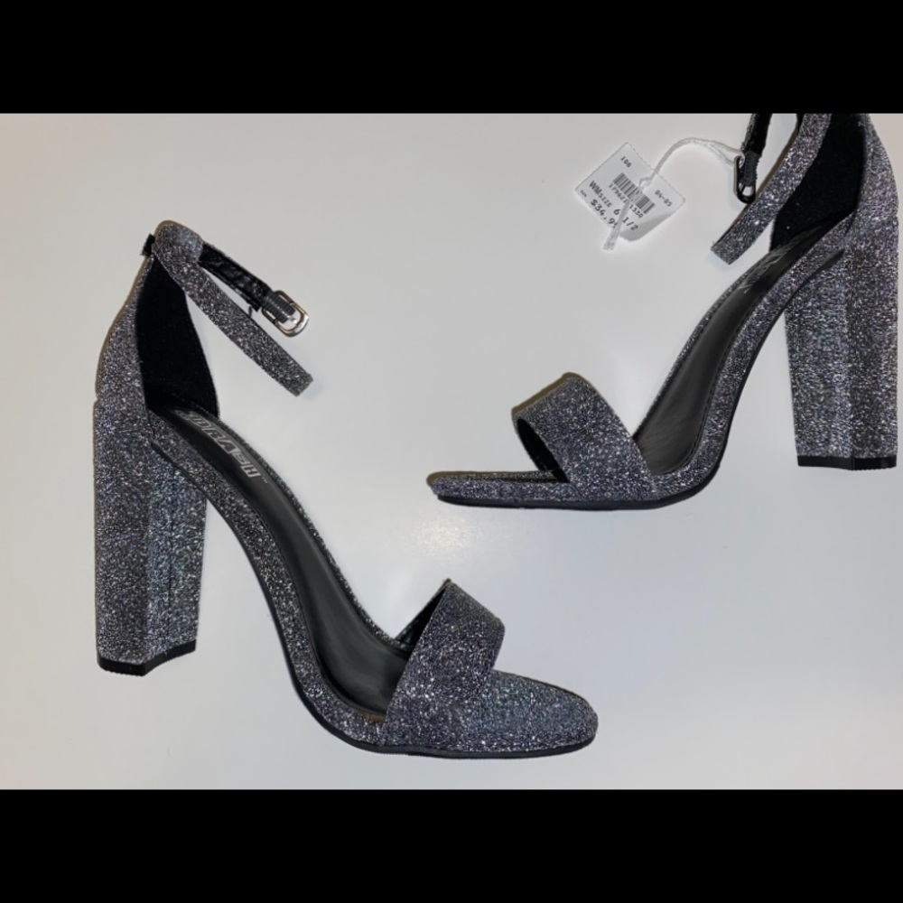 Sparkly silver chunky heels.